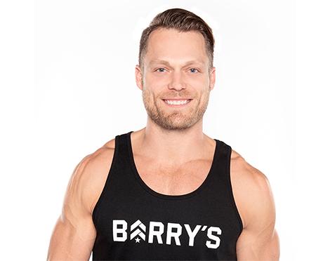 Headshot of instructor Andrew Key in black Barry's tank