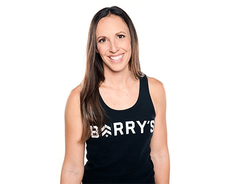 Headshot of Barry's instructor Angel Chelik wearing black tank