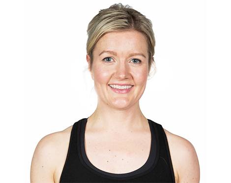 Headshot of instructor Cecilie Sletteng in black tank top smiling on white background