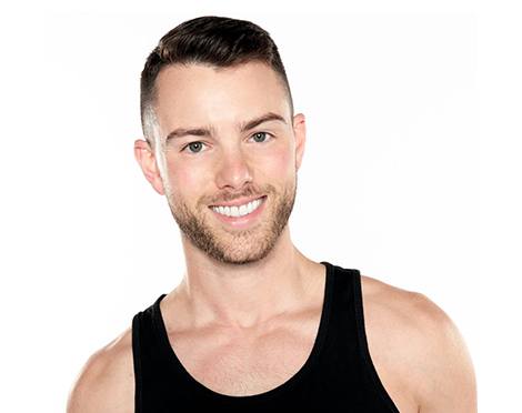 Barry's instructor David Petruzzi in black tank