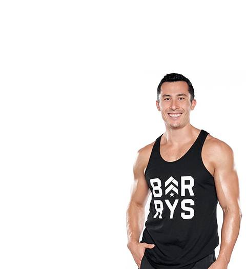 barrys instruktör Jeffrey Langewisch klädd i svart tank
