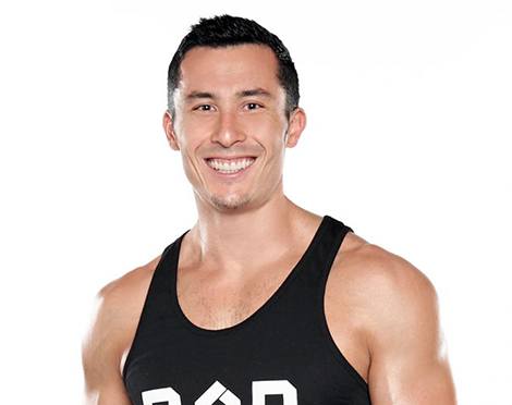 Barry's instructor Jeffrey Langewisch wearing black tank