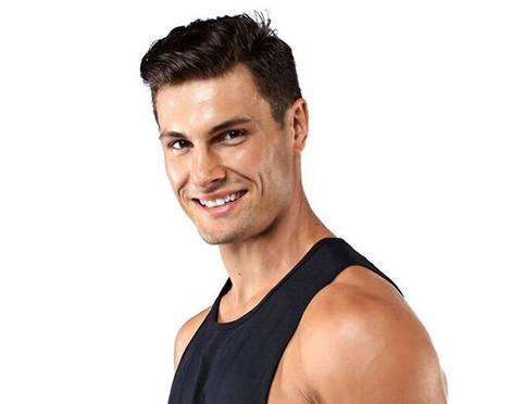 Headshot of instructor Joe Nicastro in black tank top smiling on white background
