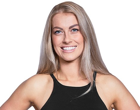 Headshot of Barry's Bootcamp instructor Lillie Smith against a white background.