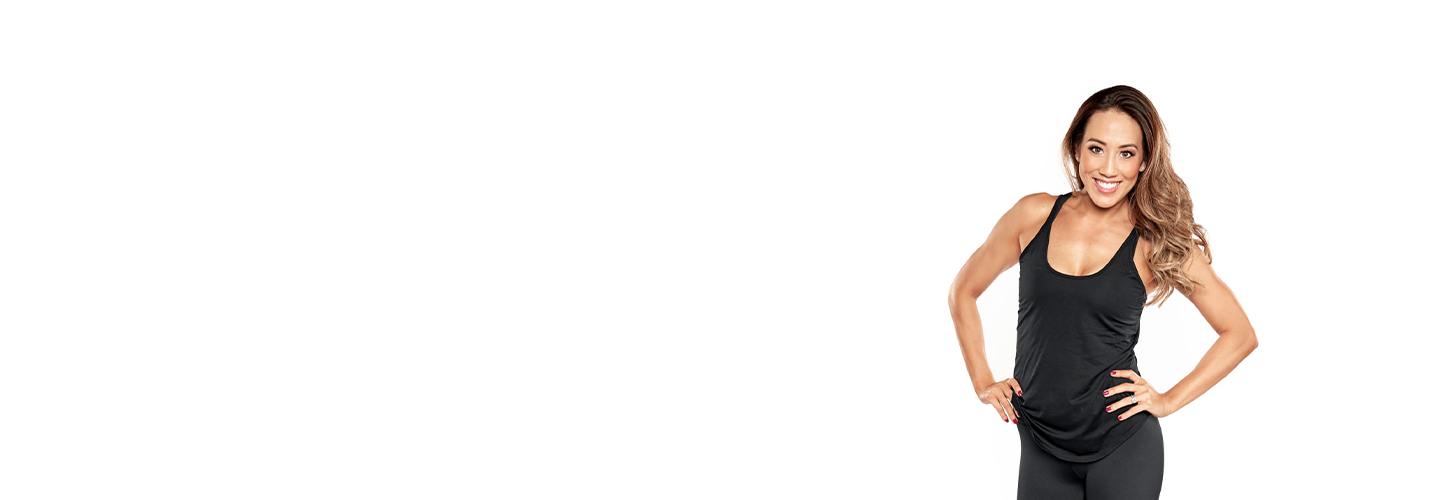 Barry's instructor Megan Johnson wearing black tank with hands on hips