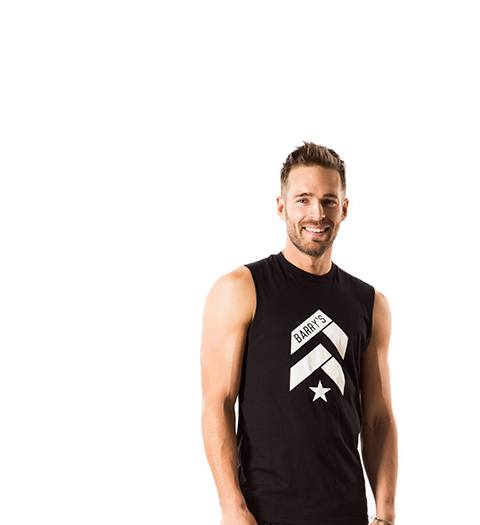 barry's instructor Sandy Macaskill wearing black tank