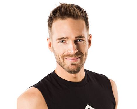 barry's instructor Sandy Macaskill wearing black tank