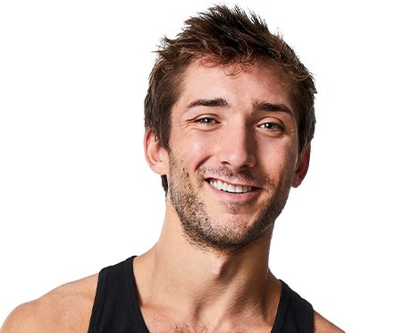 Headshot of Barry's Bootcamp instructor Taylor Walsh on white background.