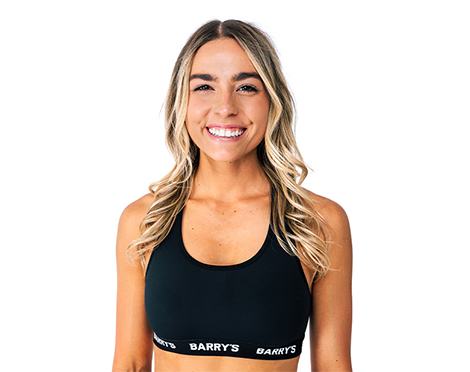 Headshot of Barry's Bootcamo instructor Lexi Stelzer smiling against white background