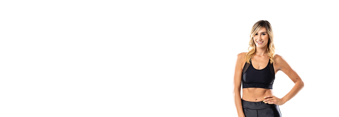 Barry's instructor standing confidently wearing a black top against a white background.