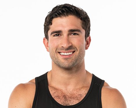 Barry's instructor standing confidently wearing a black top against a white background.