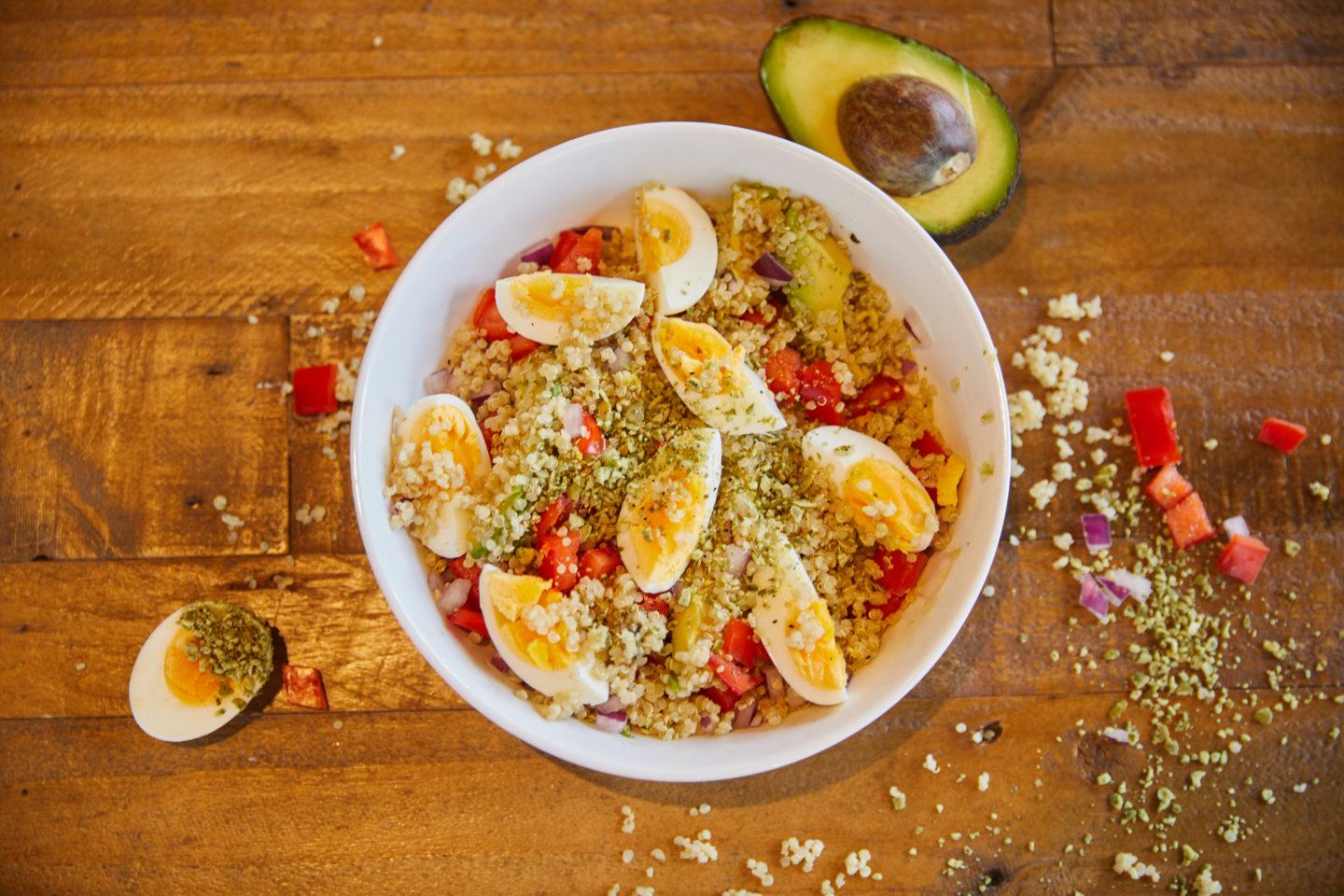 Peckish egg and avocado bowl in a white dish