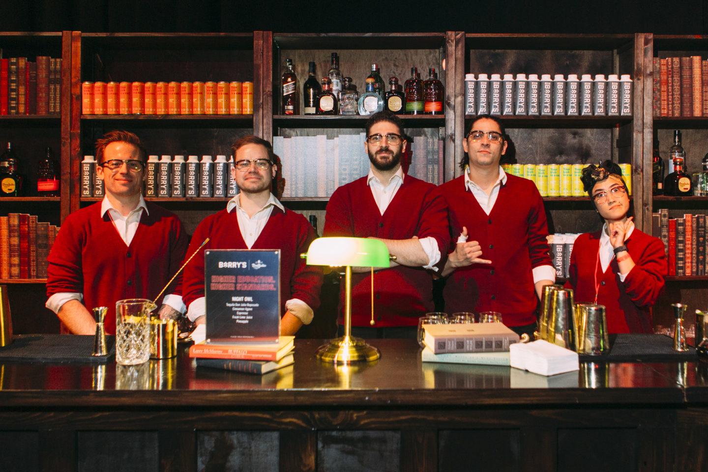 Bartenders at the library bar setup