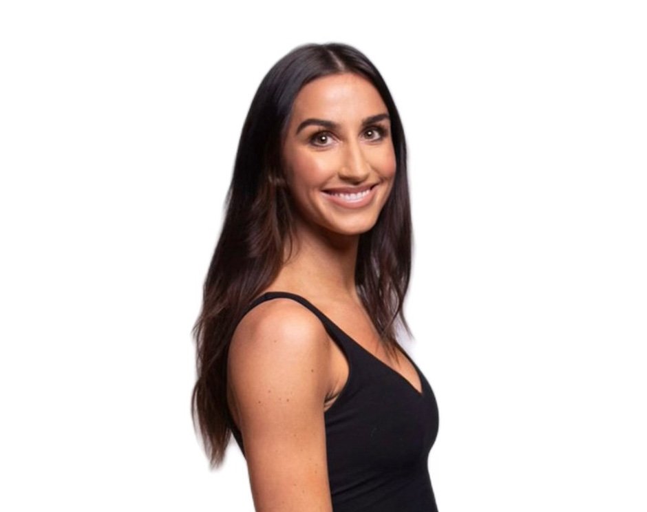 Barry's instructor standing confidently wearing a black top against a white background.