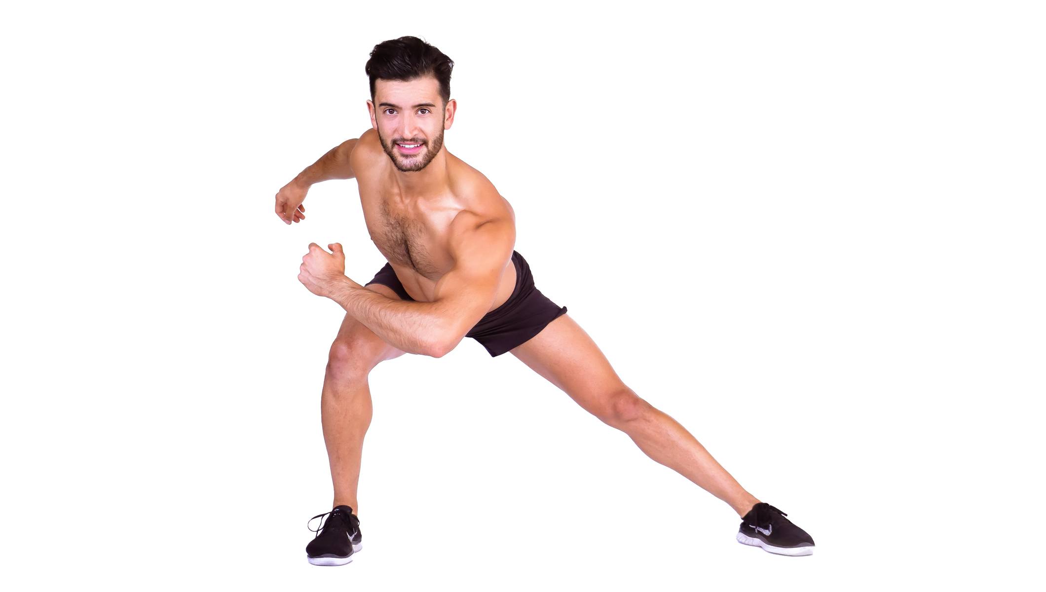Barry's instructor shirtless doing a side lunge.