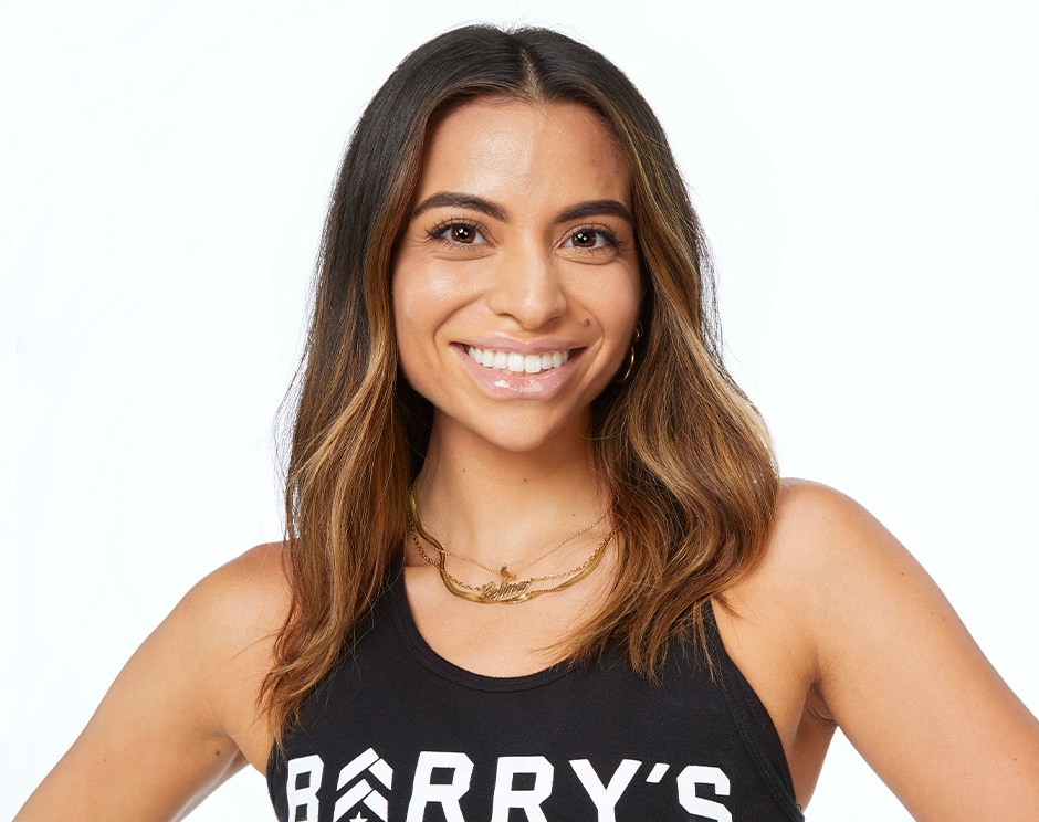 Barry's instructor standing confidently wearing a black top against a white background.