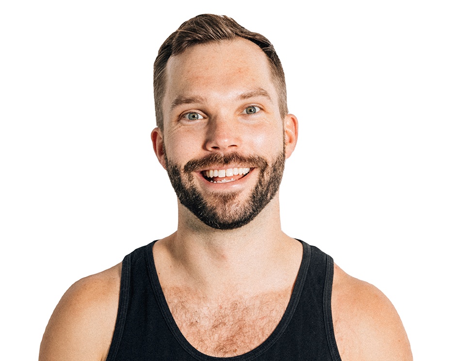 Barry's instructor standing confidently wearing a black top against a white background.