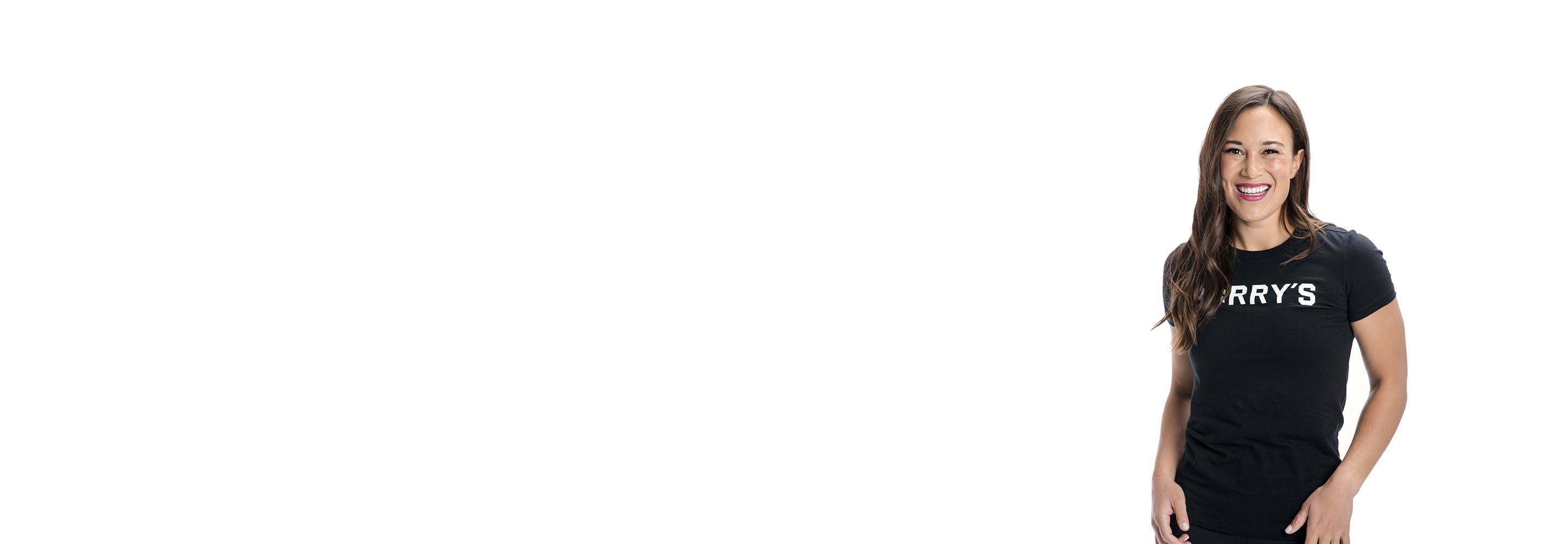 Barry's instructor standing confidently wearing a black top against a white background.