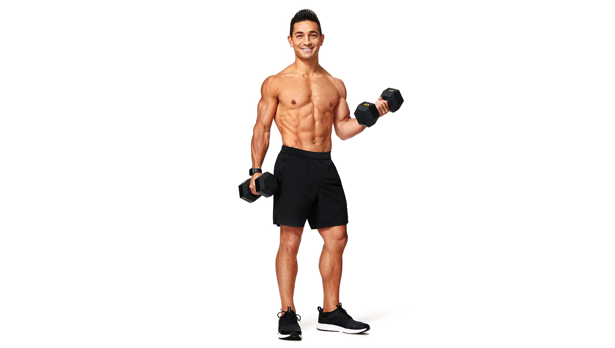 Barry’s instructor shirtless wearing black shorts holding weights out to the side
