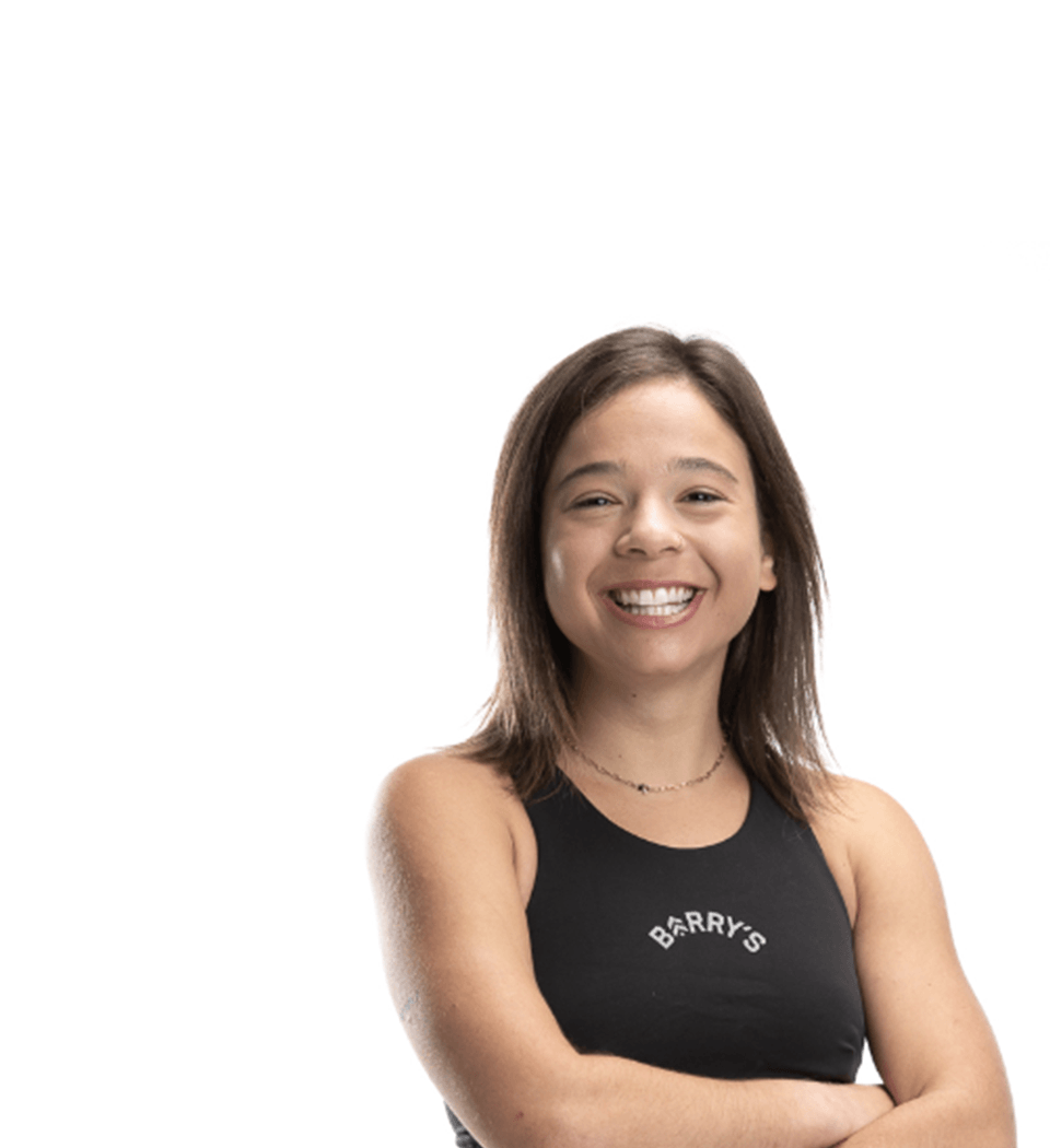 Barry's instructor standing confidently wearing a black top against a white background.