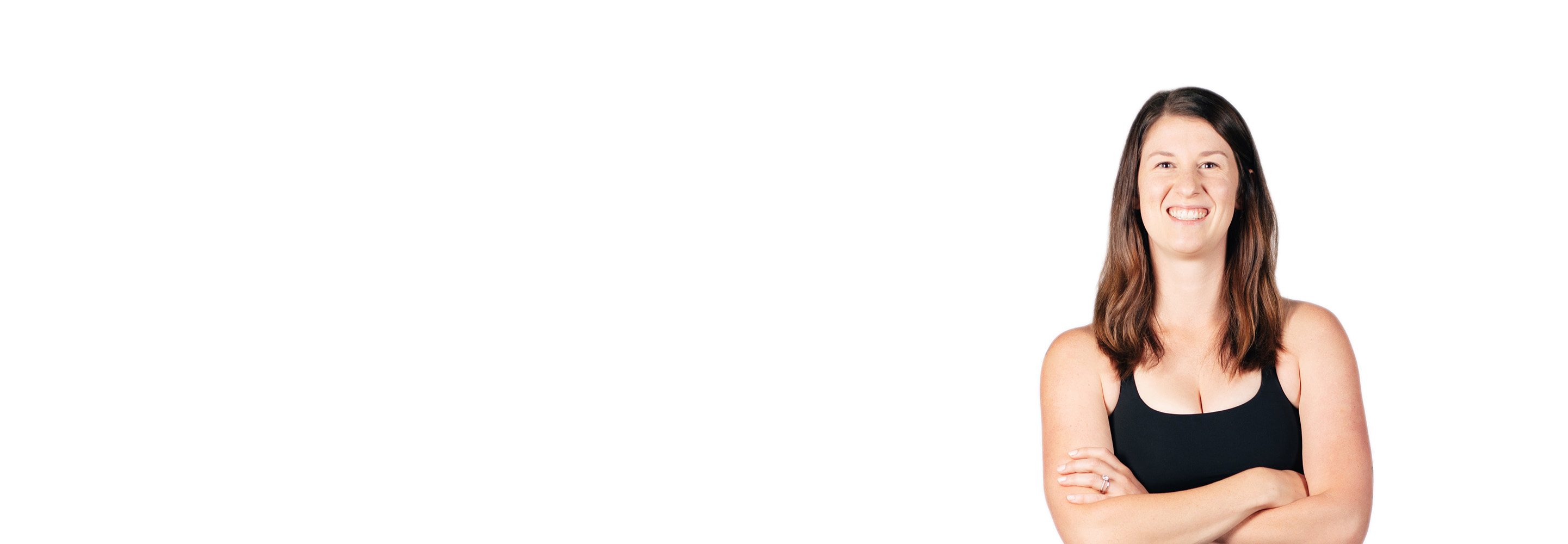 Barry's instructor standing confidently wearing a black top against a white background.