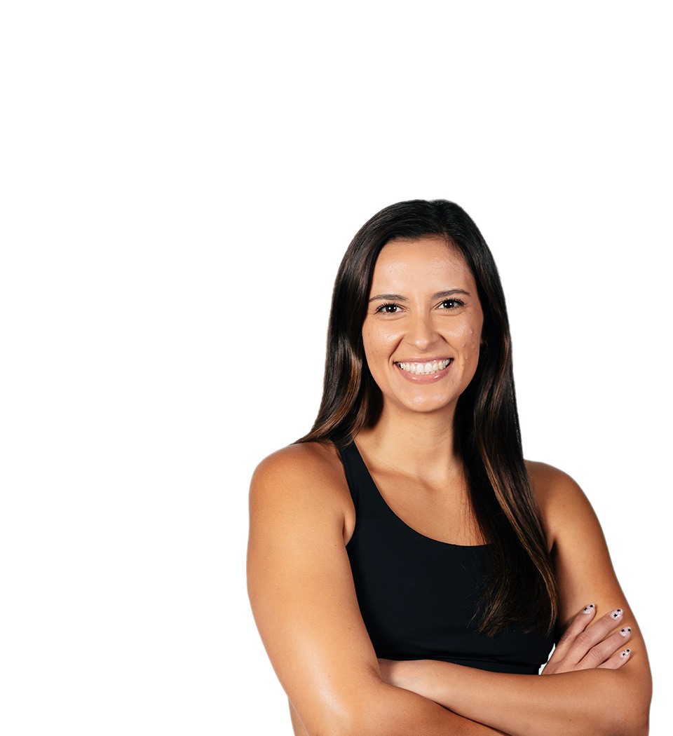 Barry's instructor standing confidently wearing a black top against a white background.