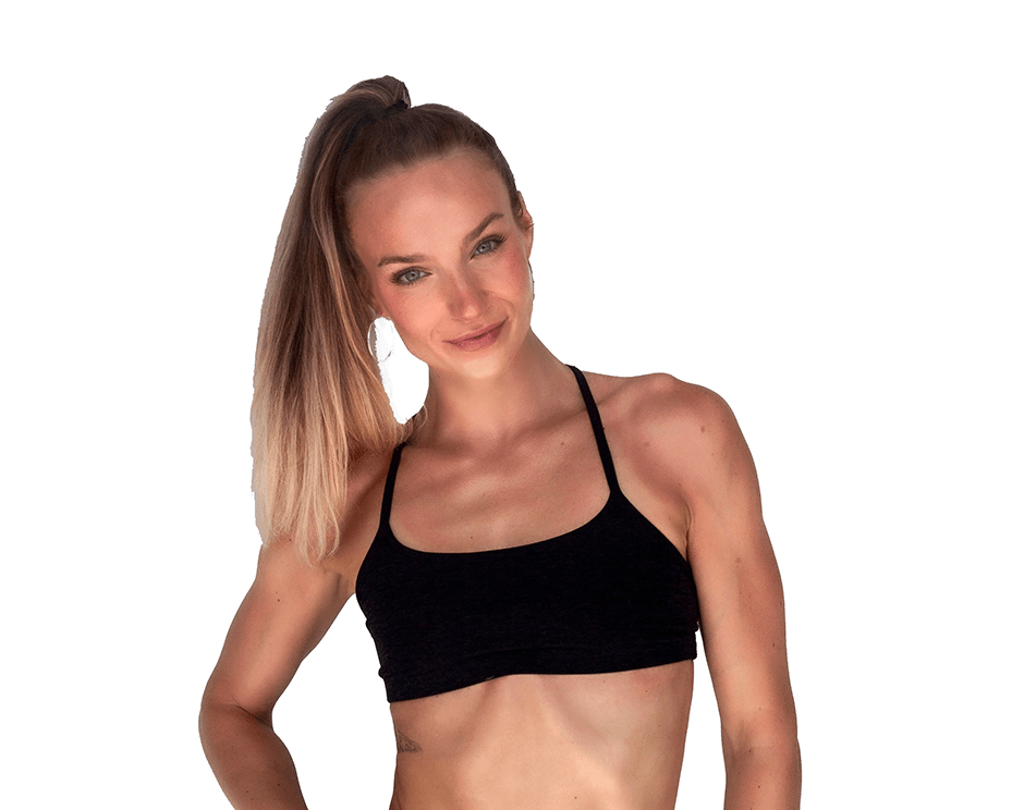 Barry's instructor standing confidently wearing a black top against a white background.