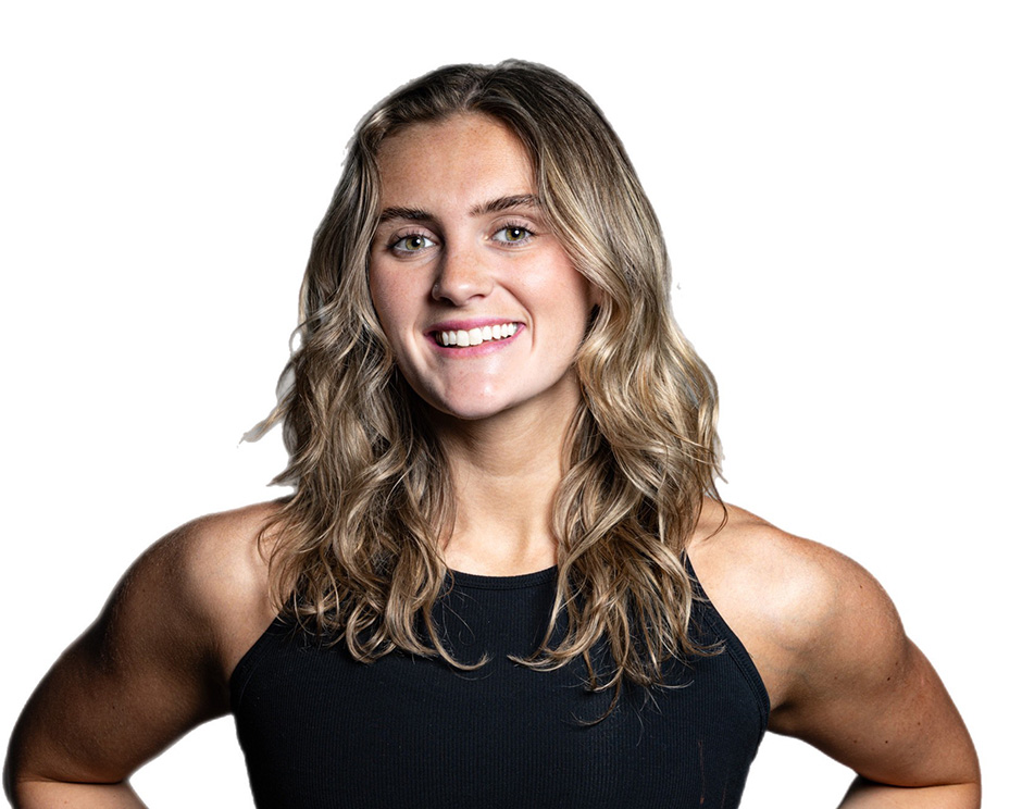 Barry's instructor standing confidently wearing a black top against a white background.