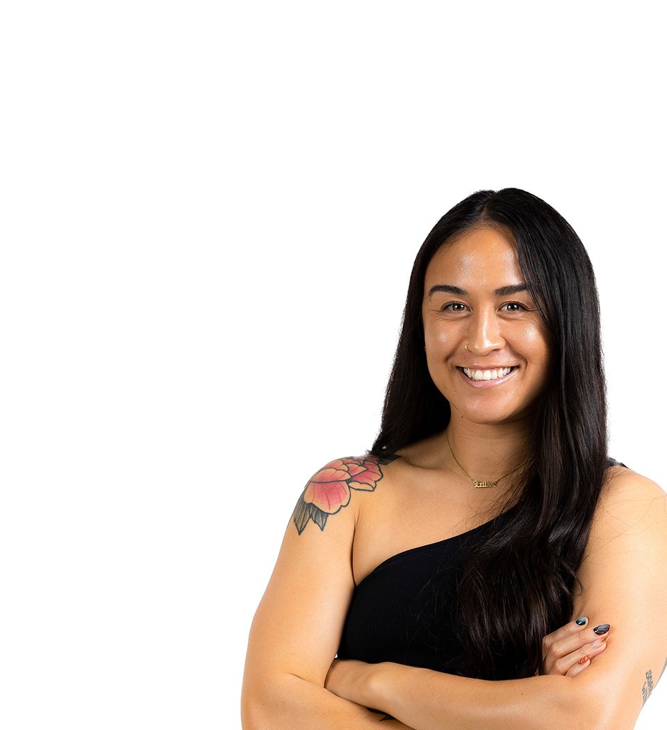 Barry's instructor standing confidently wearing a black top against a white background.