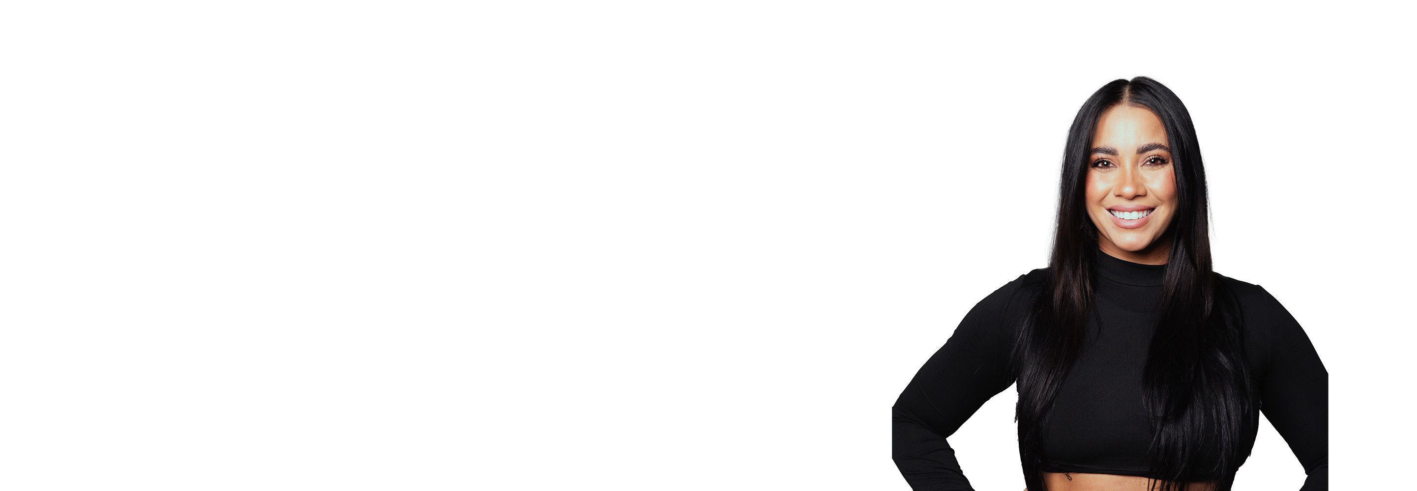 Barry's instructor standing confidently wearing a black top against a white background.