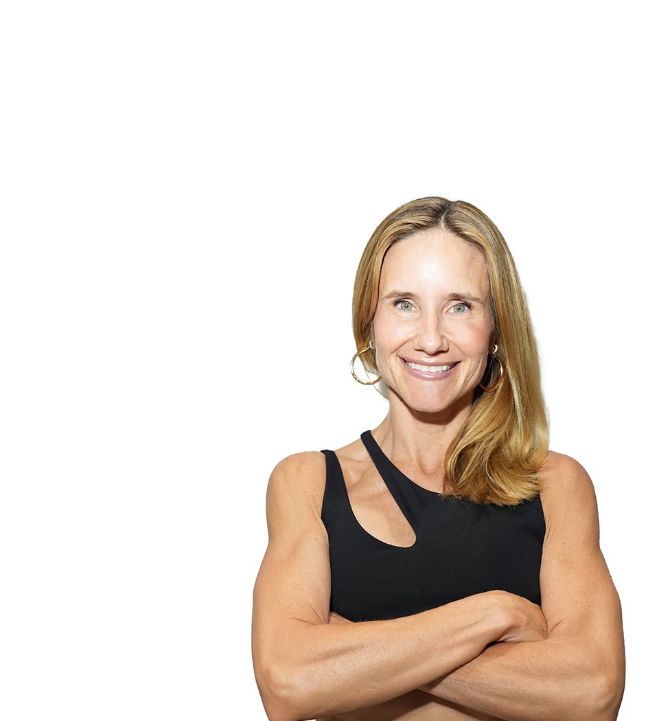Barry's instructor standing confidently wearing a black top against a white background.