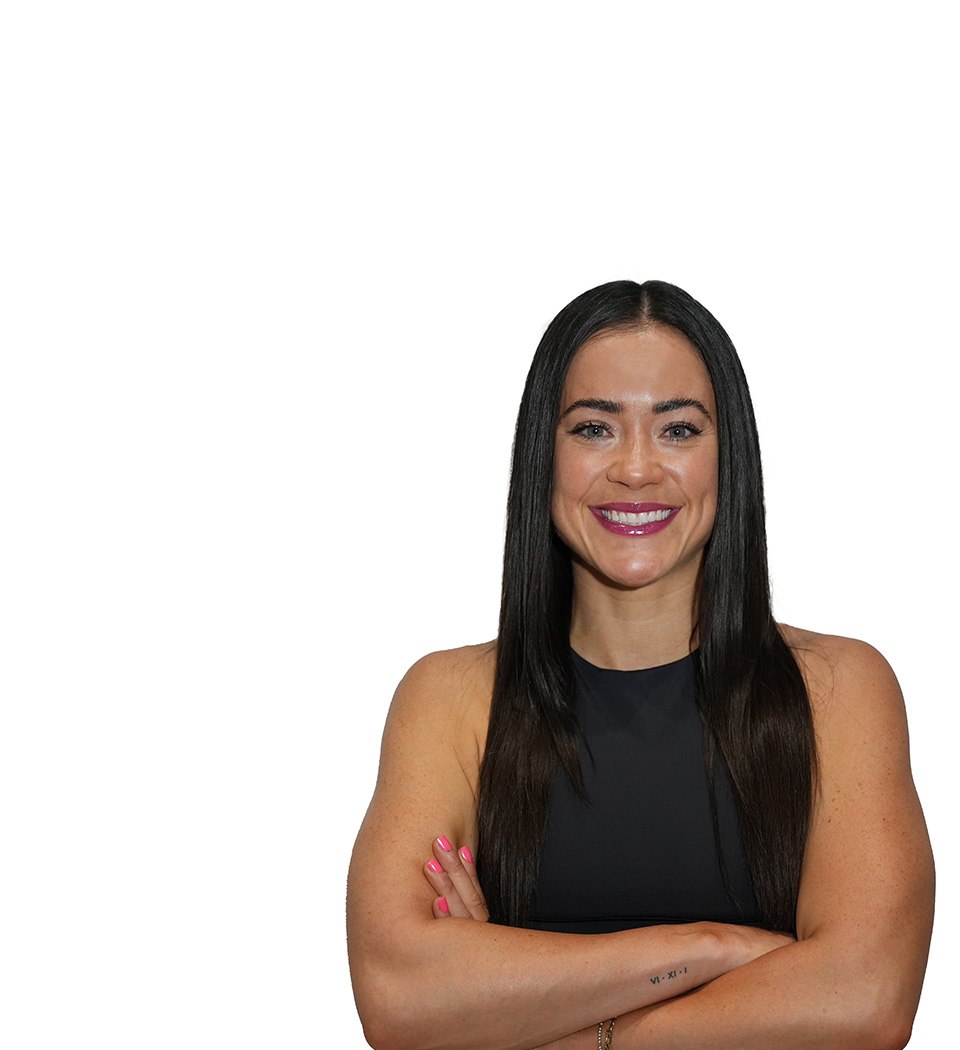 Barry's instructor standing confidently wearing a black top against a white background.