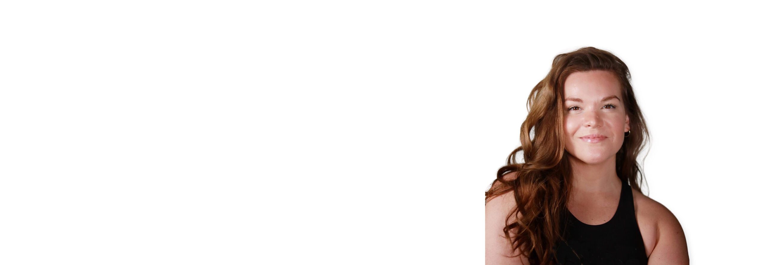 Barry's instructor standing confidently wearing a black top against a white background.