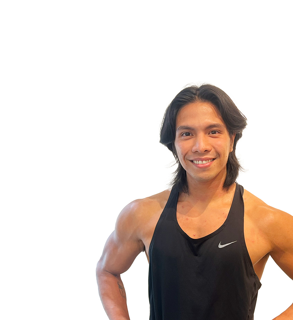 Barry's instructor standing confidently wearing a black top against a white background.