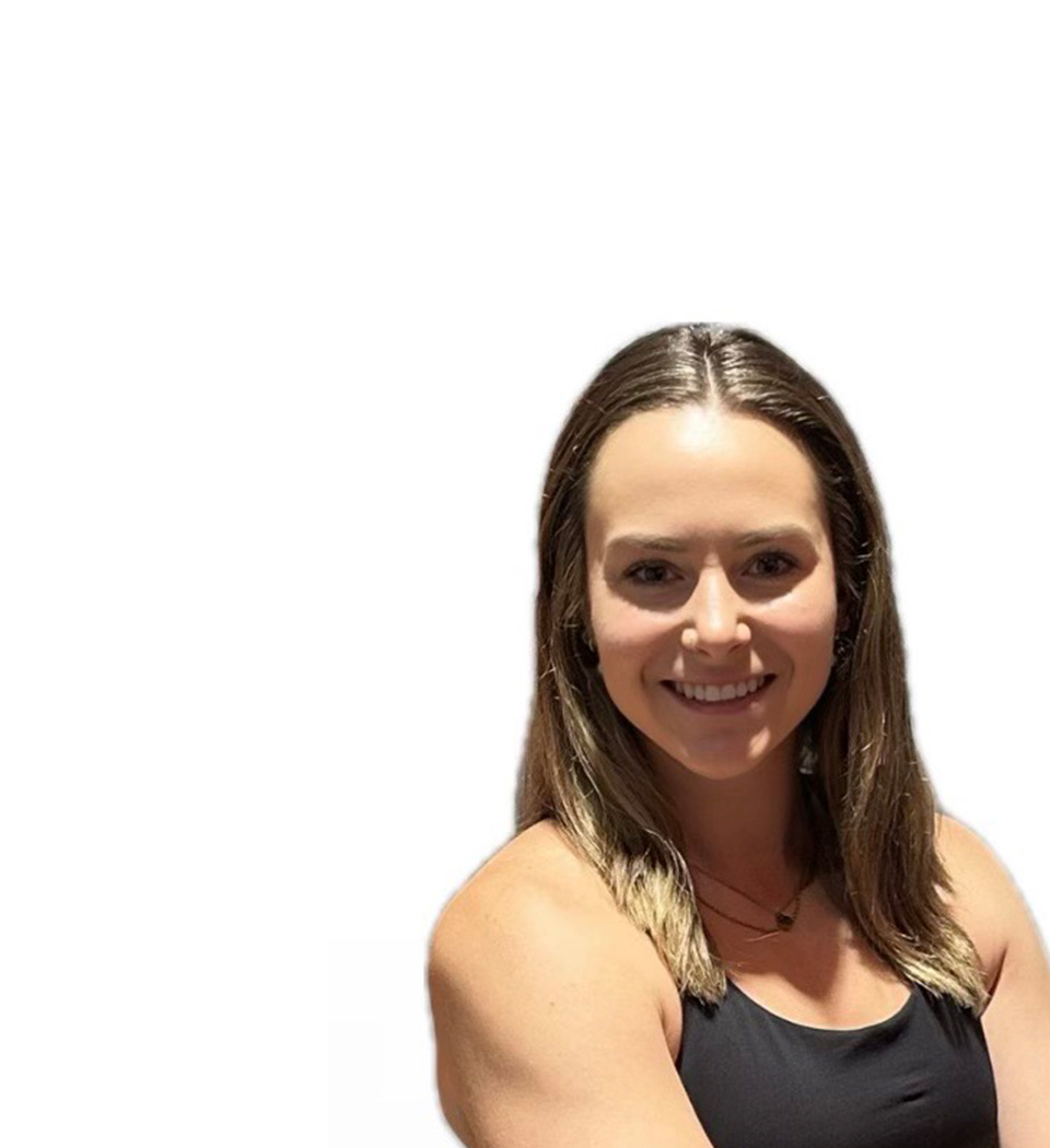 Stephanie C. Barry's instructor standing confidently wearing a black top against a white background.