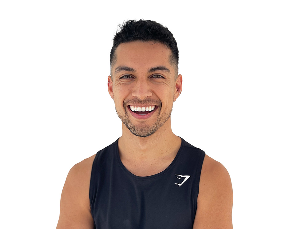 Barry's instructor standing confidently wearing a black top against a white background.