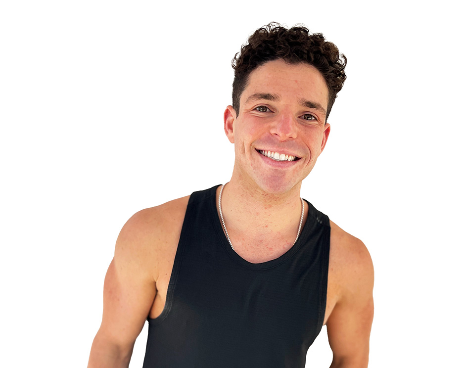 Barry's instructor standing confidently wearing a black top against a white background.