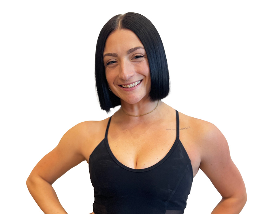 Barry's instructor standing confidently wearing a black top against a white background.