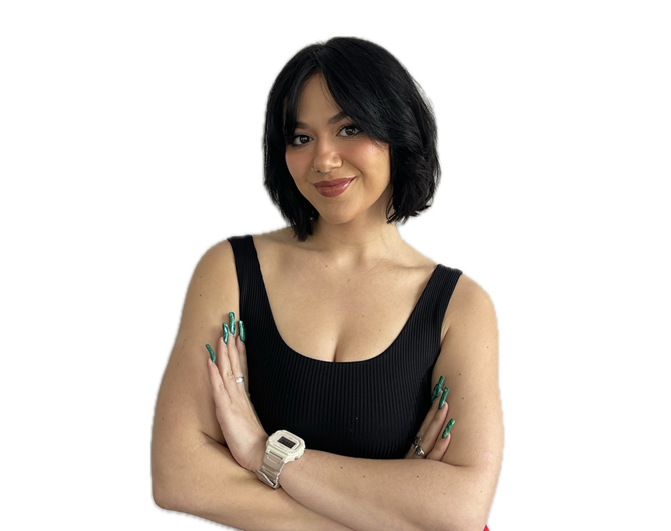 Barry's instructor standing confidently wearing a black top against a white background.