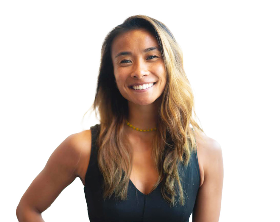 Barry's instructor standing confidently, wearing a black tank top against a white background, ready for the next workout challenge.